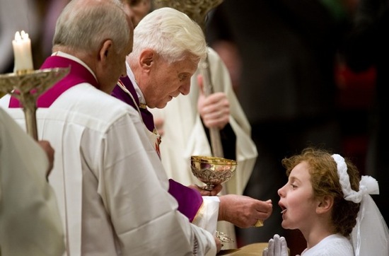 pope-benedict-distributing-the-eucharist-to-a-child.jpg